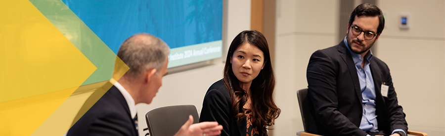three speakers at an event