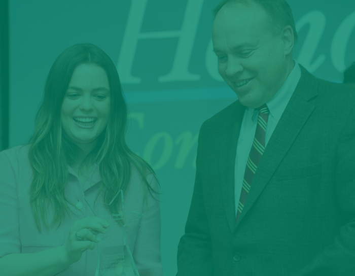 award presenter and awardee at the academic honors celebration